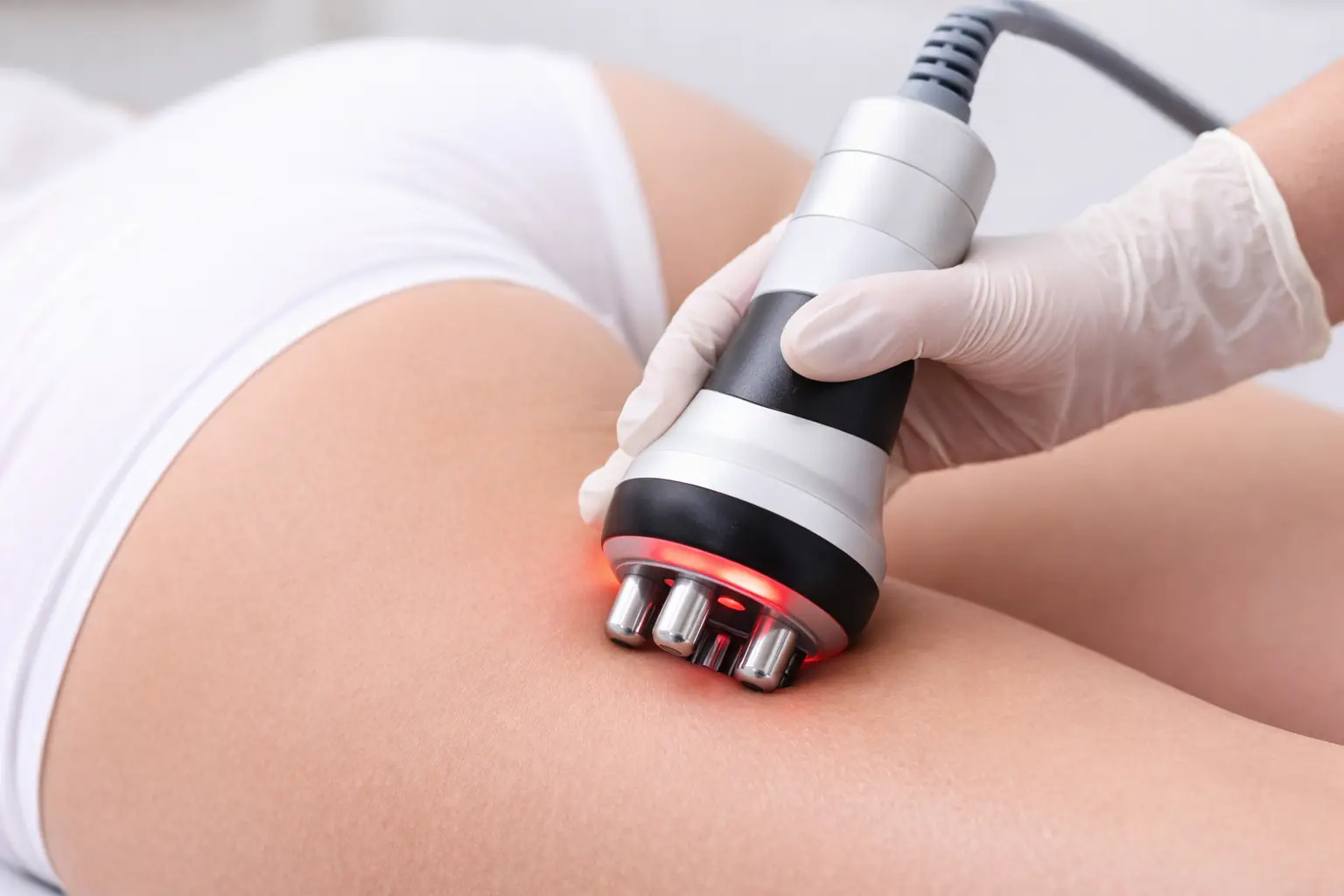 Non-surgical body contouring treatment in progress at Arizona Medlaser