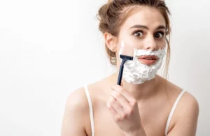 Shaving facial hair with razor leading to razor bumps and irritation in Glendale